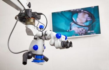 Лечение кариеса под микроскопом